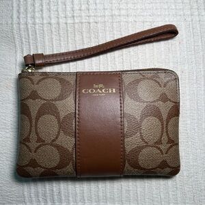 **SOLD** Coach Tan and Brown Signature Wristlet